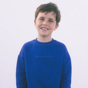 Model wearing cobalt because it's heven sweatshirt.