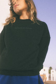 Model wearing because it's heven sweatshirt in Black.
