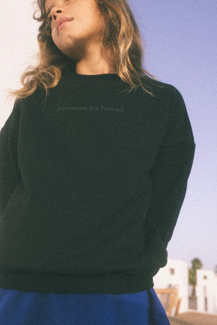 Model wearing because it's heven sweatshirt in Black.