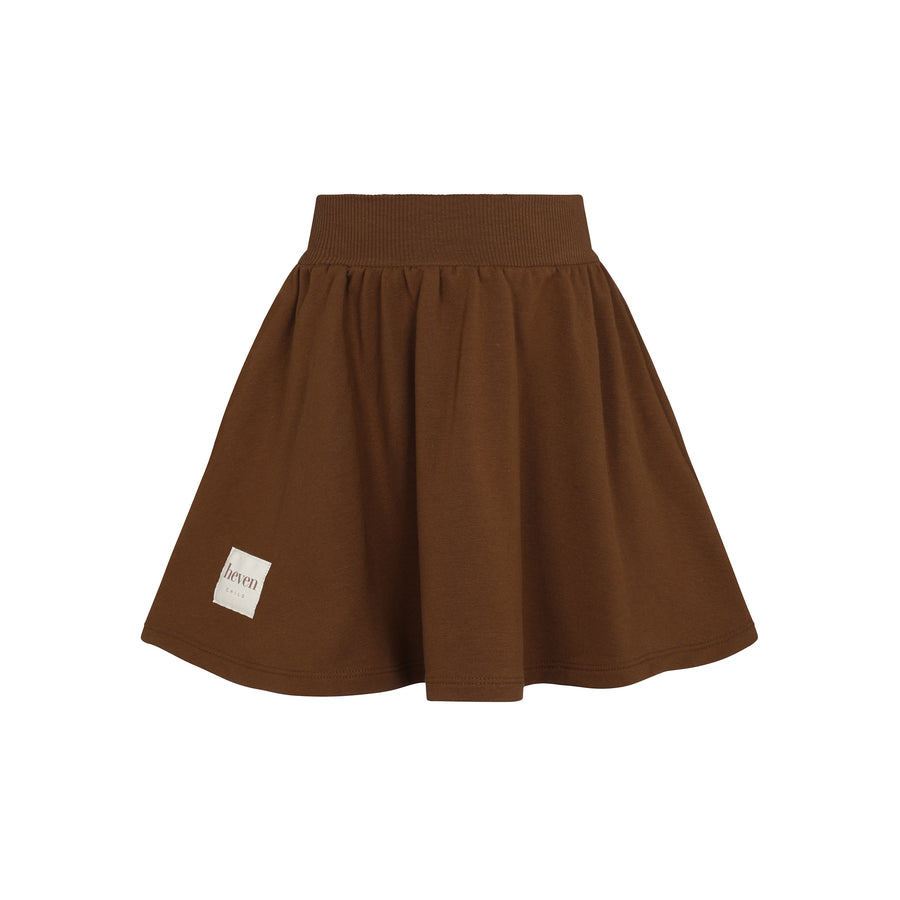 Brown skirt with a brand label on a white background