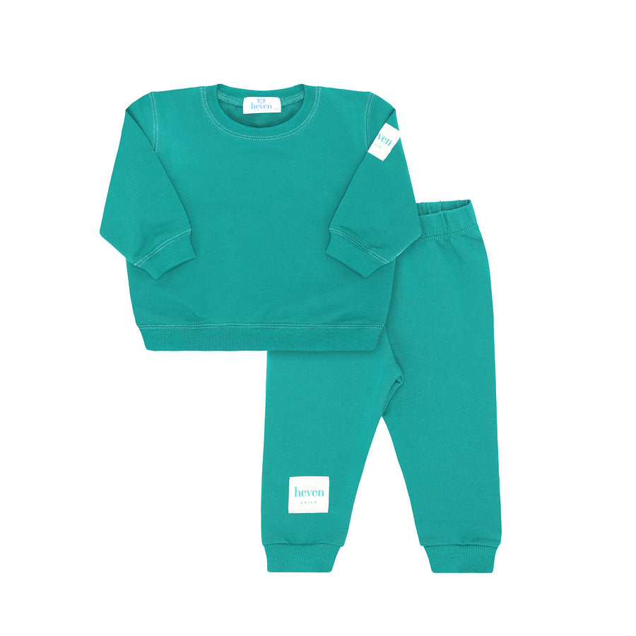 Teal children's sweatshirt and pants set on a white background