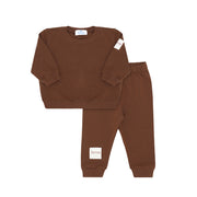 Brown children's sweatshirt and pants set on a white background