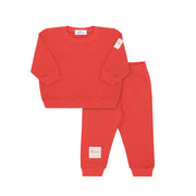 Red children's sweatshirt and pants set with 'bevin' branding on a white background