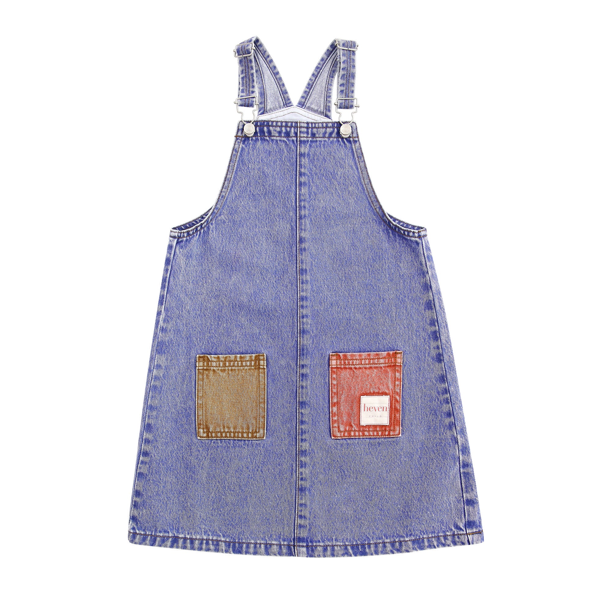 Denim pinafore dress with two patch pockets on a white background