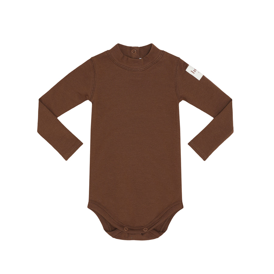 Brown baby bodysuit with a tag on a white background