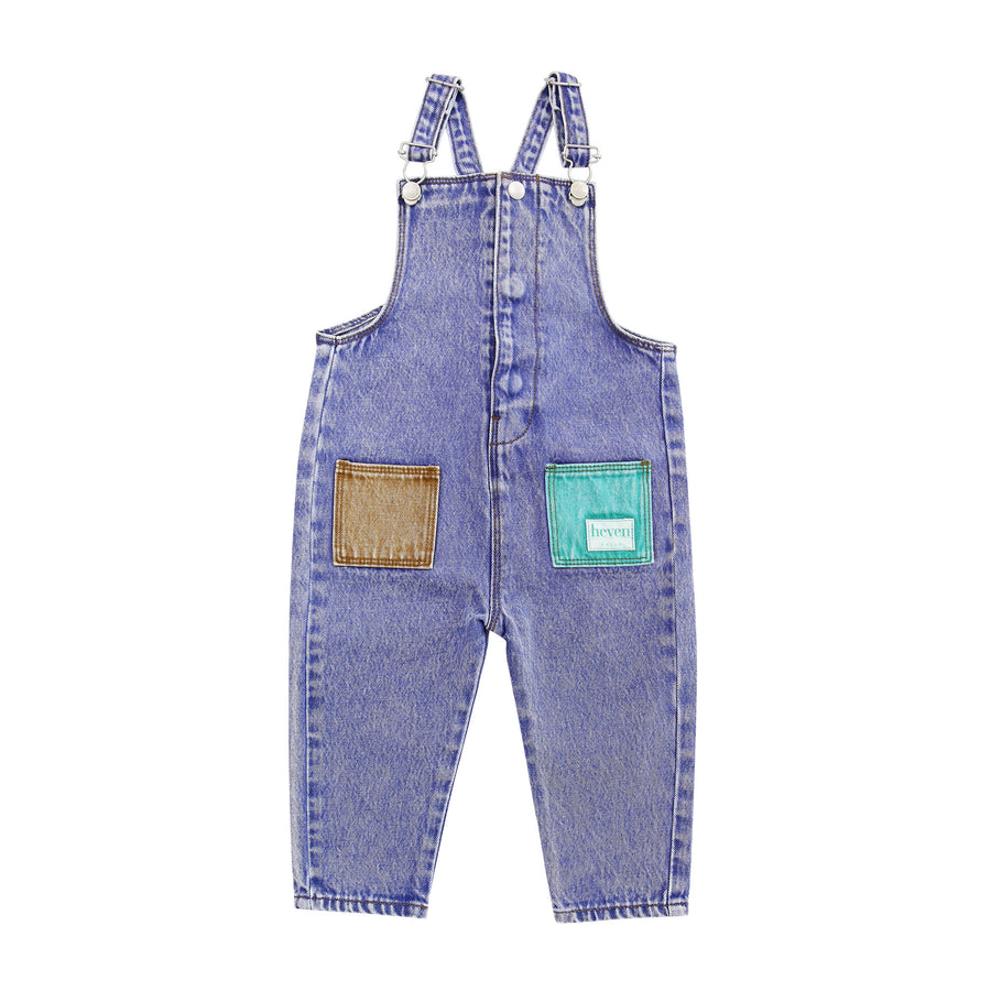 Blue denim overalls with two pockets on a white background