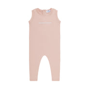 Pink baby romper with a brand label on a white background