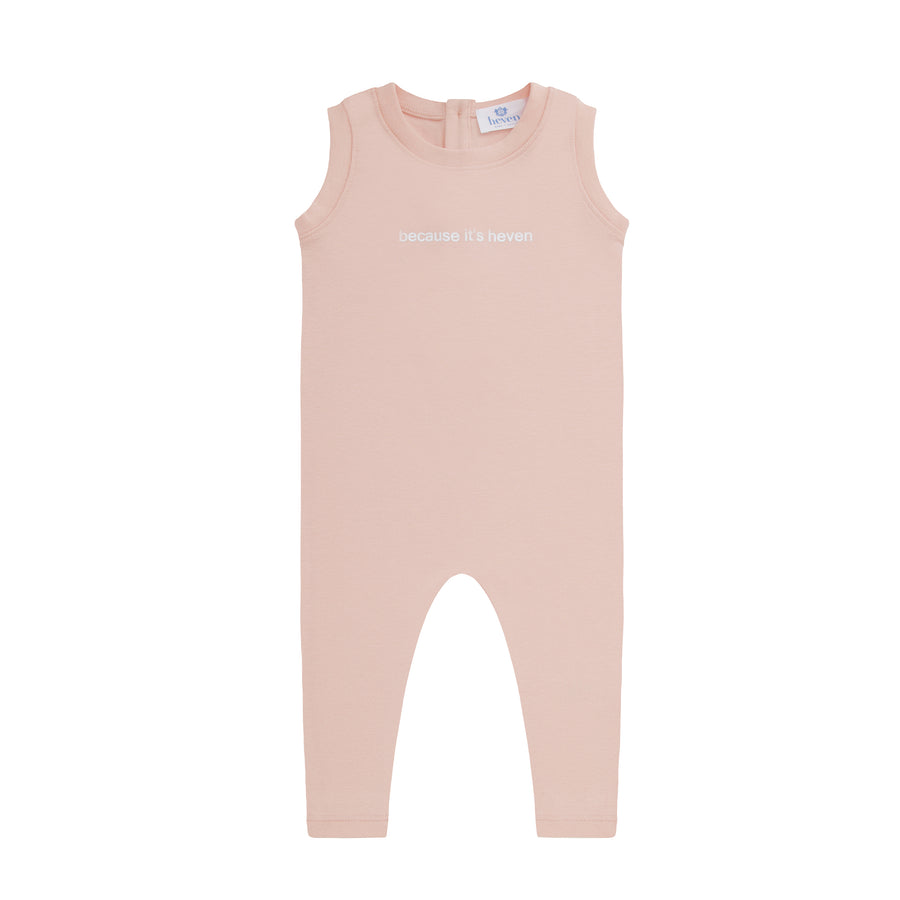 Pink baby romper with a brand label on a white background