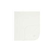 White swaddling blanket folded on a white background