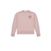 Pink sweatshirt on white background. 