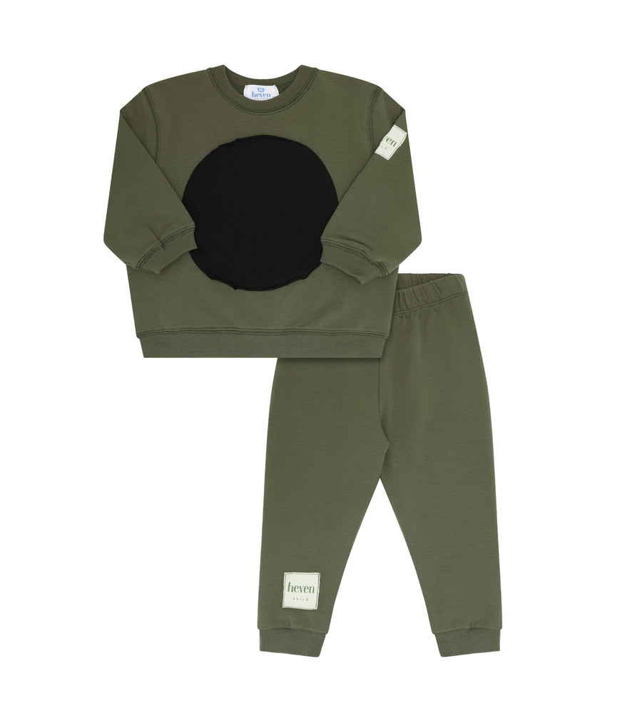 Green sweatpants and sweatshirt on white background.