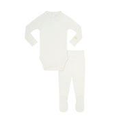 A baby two-piece clothing set consisting of a long-sleeve bodysuit and matching footed leggings, both in solid white, laid flat on a white background.