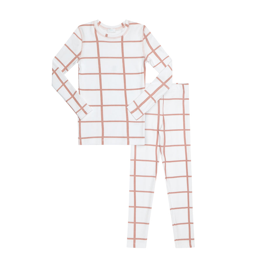 kids pajama set in pink and white grid pattern