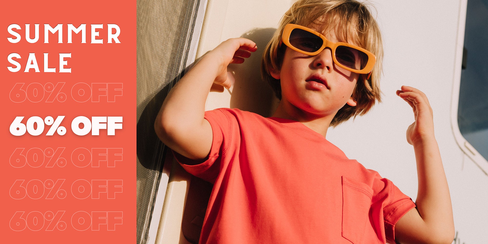 Child wearing orange sunglasses with a summer sale banner on the left
